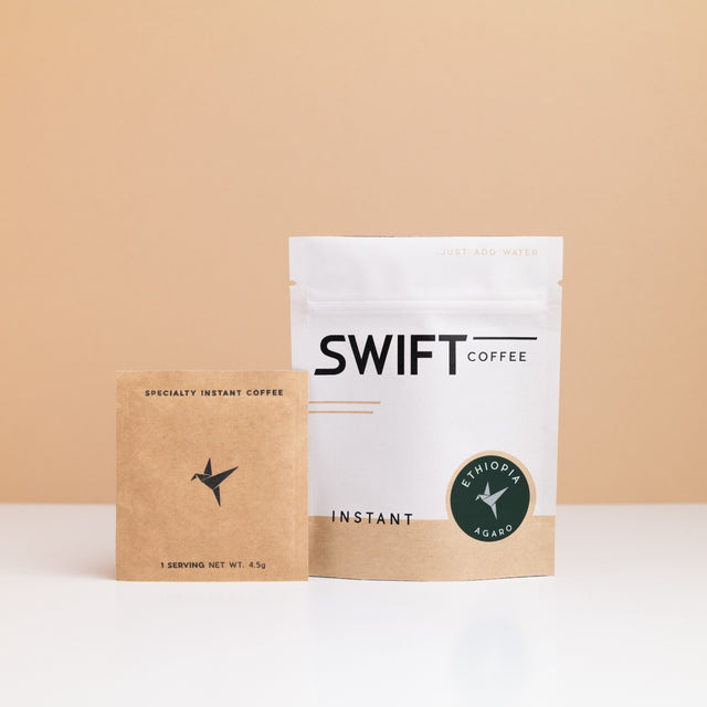 Swift Coffee Ethiopia – Agaro instant coffee: white pouch with a green Ethiopia Agaro label and a kraft single-serve sachet