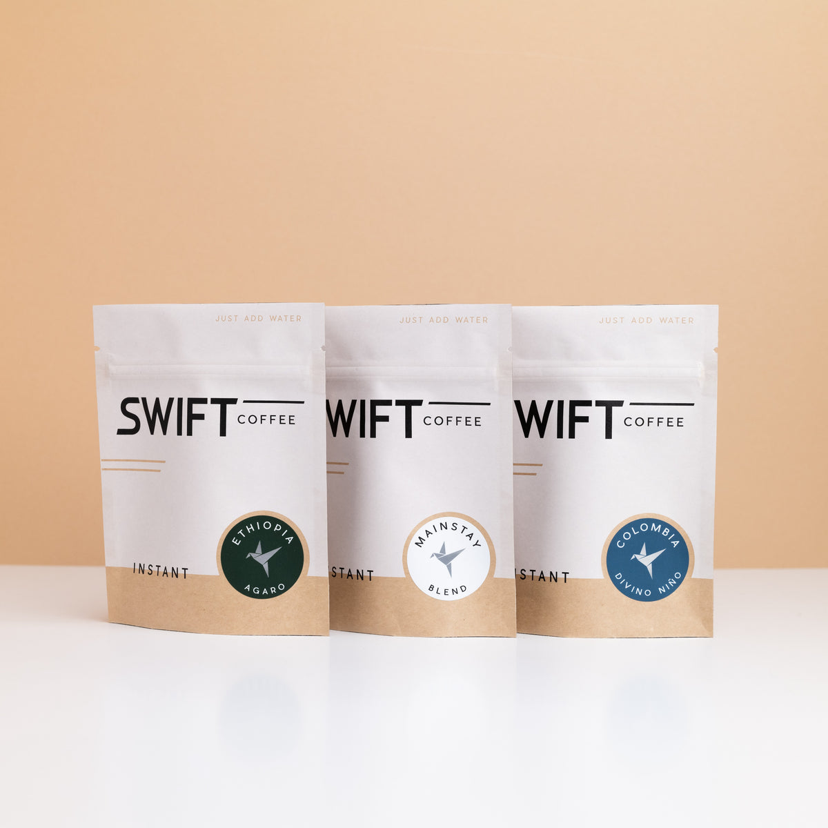 Three Swift Coffee pouches from The Essentials set: Mainstay Blend, Ethiopia Agaro and Colombia