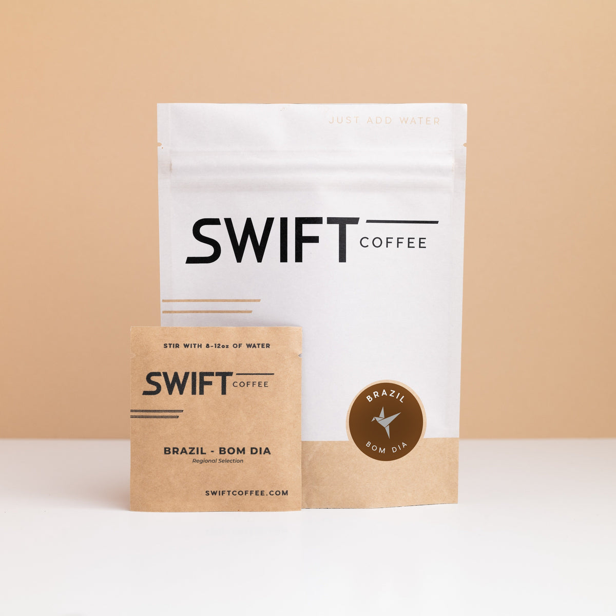 Swift Coffee Brazil Bom Dia instant coffee pouch with a labeled Brazil Bom Dia single-serve sachet in front