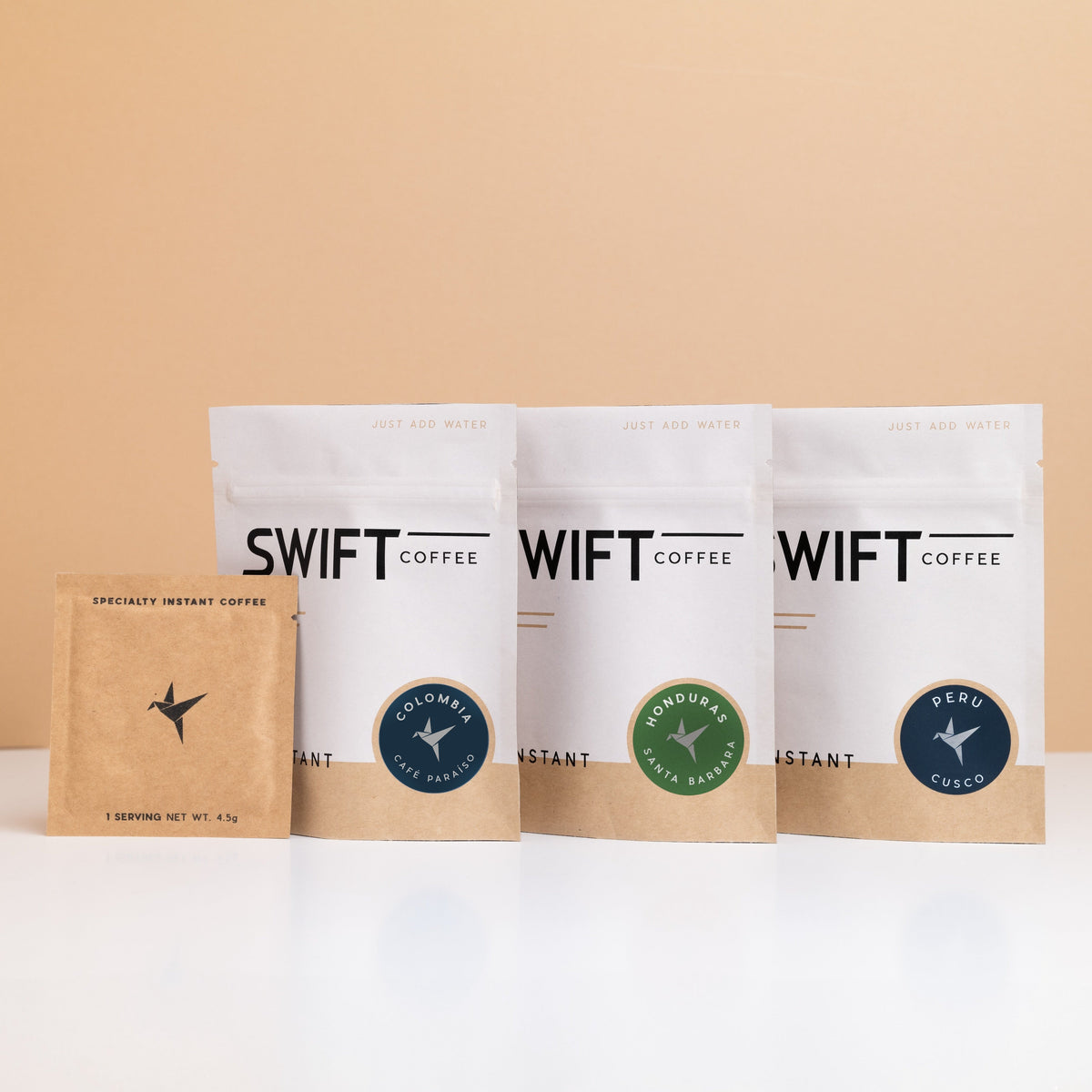 Three Swift Coffee instant pouches from the Latin American Trio: Colombia Cafe Paraiso, Honduras Santa Barbara and Peru Cusco