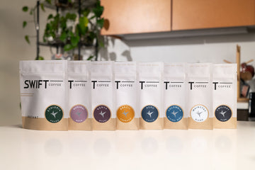 The full Swift Coffee instant lineup of pouches on a kitchen counter