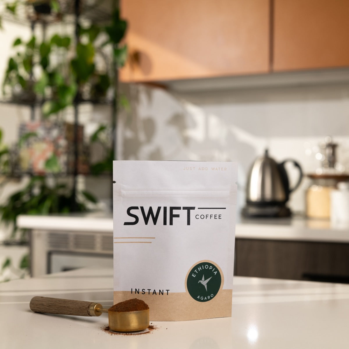 Swift Coffee Ethiopia Agaro instant coffee, 25-cup bulk pouch, on a kitchen counter