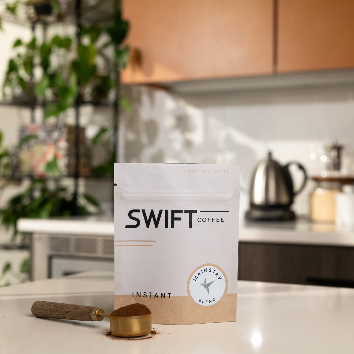Swift Coffee Mainstay Blend instant coffee, 25-cup bulk pouch, on a kitchen counter