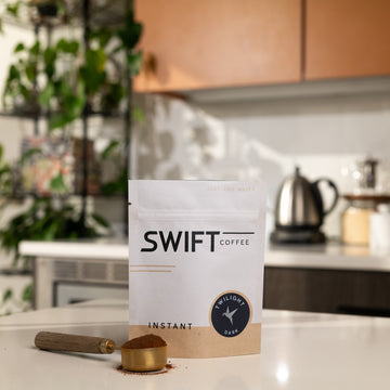 Swift Coffee Twilight Dark Roast instant coffee, 25-cup bulk pouch, on a kitchen counter