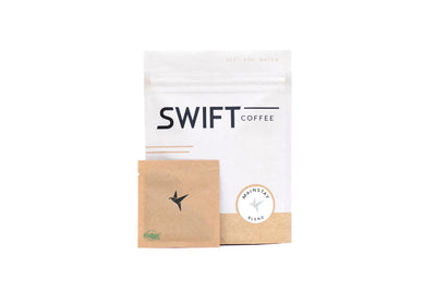 Swift Coffee Mainstay Blend instant coffee pouch with a kraft single-serve sachet, on a white background