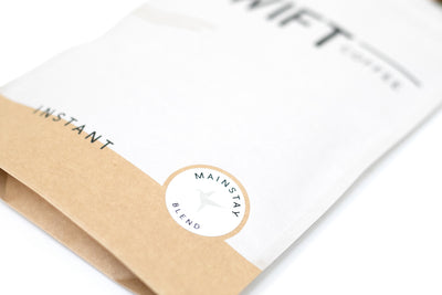Close-up of the label on a Swift Coffee Mainstay Blend instant coffee pouch