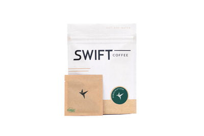 Swift Coffee Variety Pack instant coffee pouch with a kraft single-serve sachet, on a white background